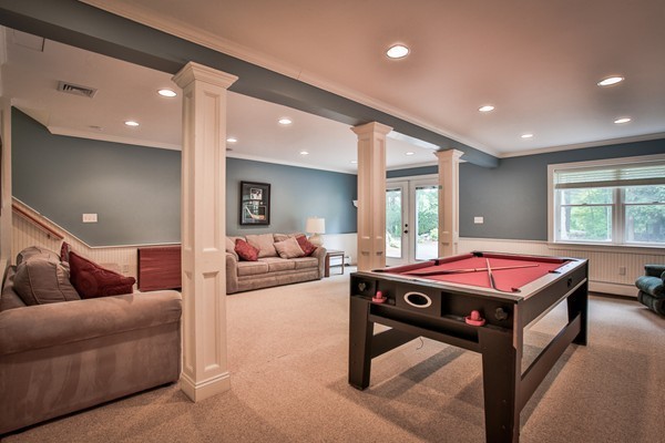 84 Sunset Rock Road Andover, MA 01810 - Photo 28 of 30 a living room with a couch and a large window