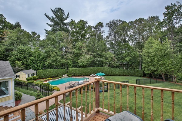 84 Sunset Rock Road Andover, MA 01810 - Photo 3 of 30 a view of a balcony with two plants