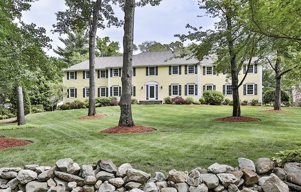 84 Sunset Rock Road Andover, MA 01810 - Photo 4 of 30 a front view of a house with a yard