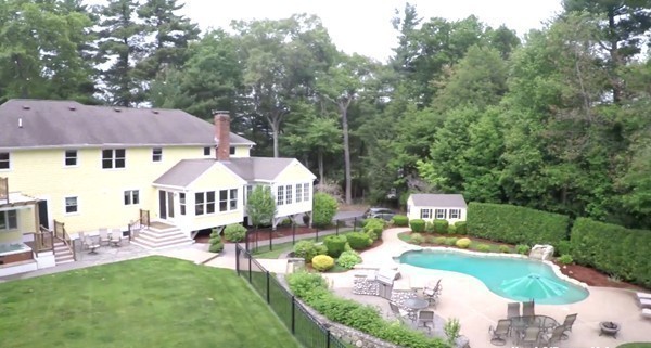 84 Sunset Rock Road Andover, MA 01810 - Photo 6 of 30 a view of a house with swimming pool and sitting area