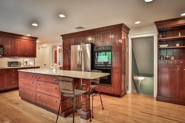 84 Sunset Rock Road Andover, MA 01810 - Photo 10 of 30 a kitchen with stainless steel appliances granite countertop a refrigerator and a stove top oven