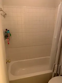 a view of a bathtub in bathroom