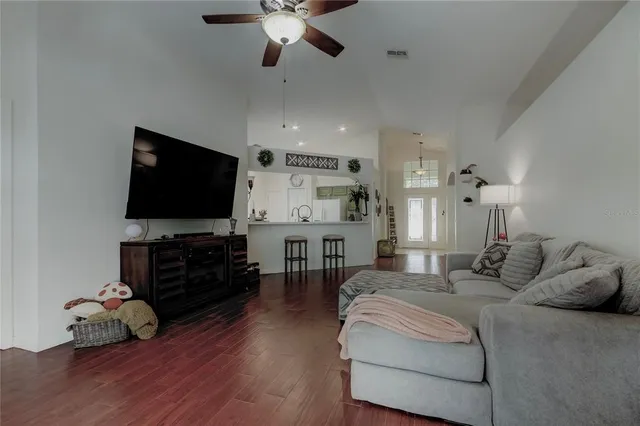 a kitchen with a refrigerator and cabinets