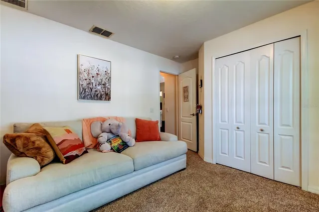 a bathroom with a double vanity sink mirror and bathtub