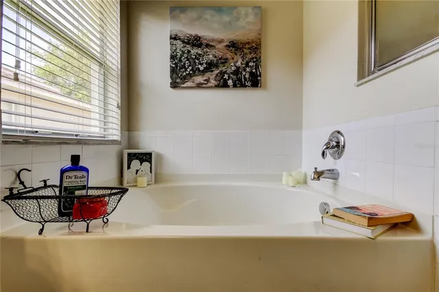 a kitchen with stainless steel appliances a refrigerator and a sink