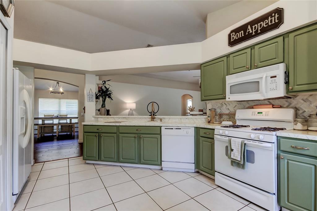 4522 Lisette Circle Brooksville, FL 34604 - Photo 41 of 59 a kitchen with a sink and cabinets