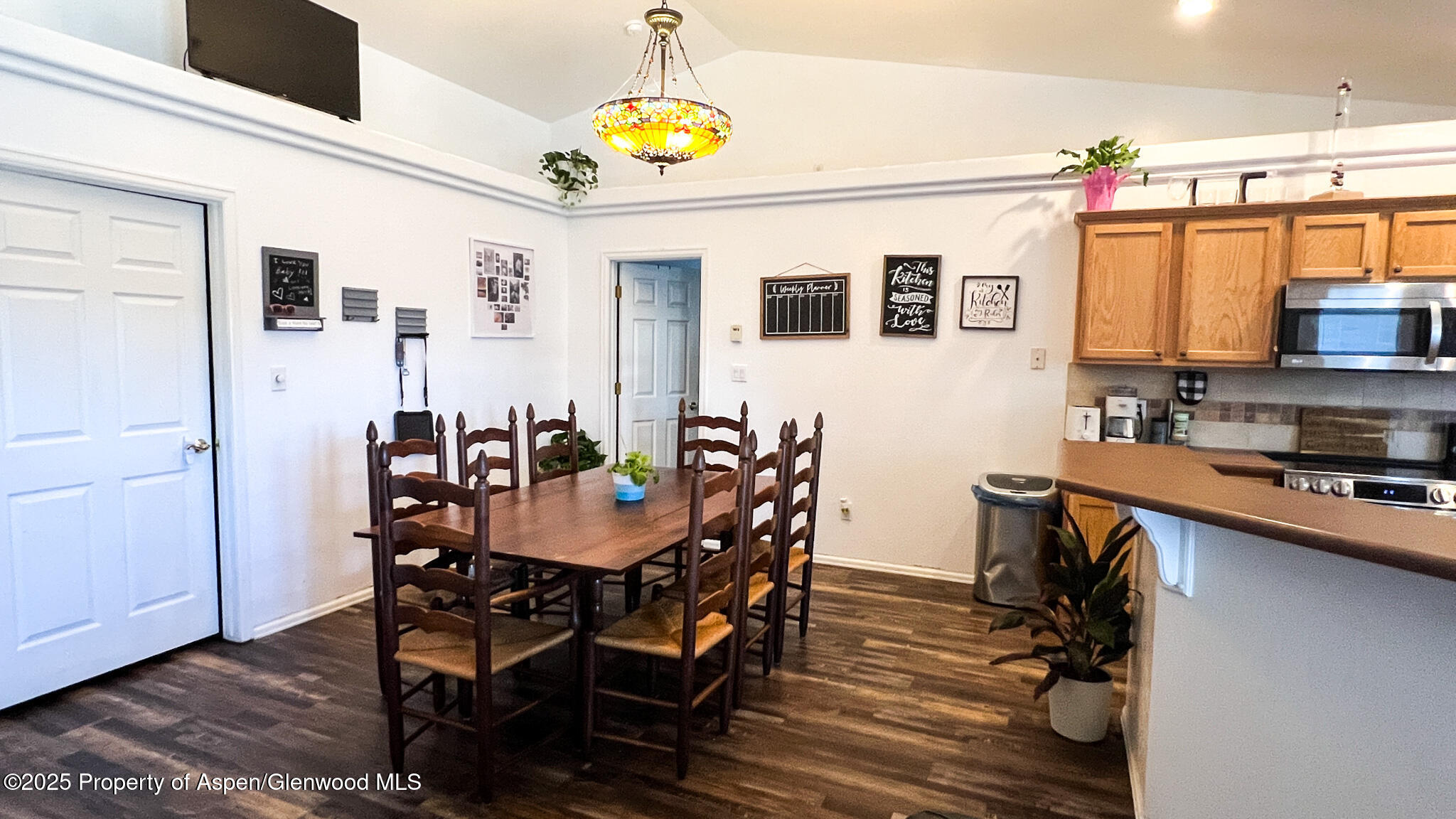 786 Comstock Drive Fruita, CO 81521 - Photo 12 of 38 a view of a dining room with furniture
