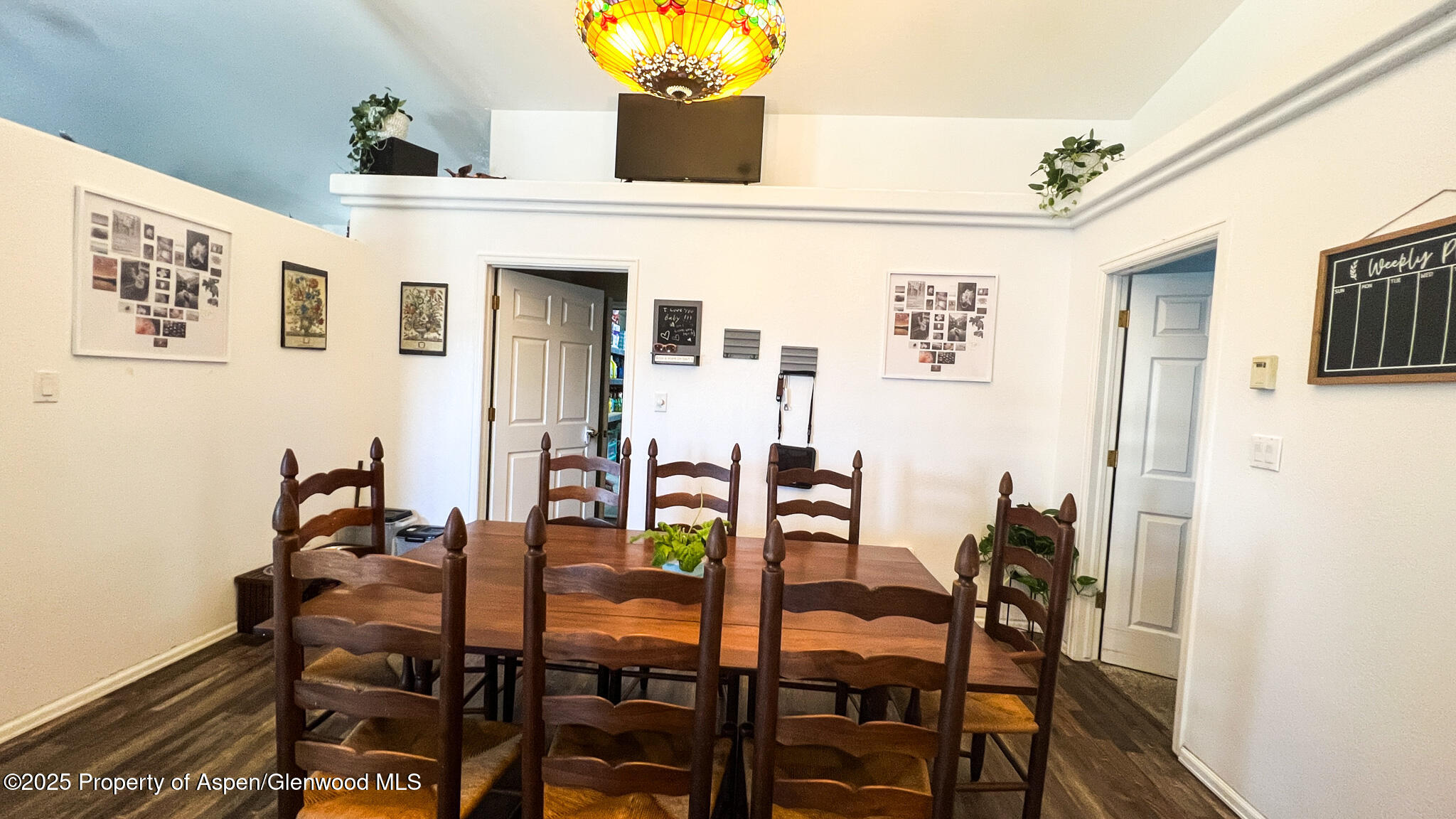786 Comstock Drive Fruita, CO 81521 - Photo 13 of 38 a dining room with furniture and wooden floor