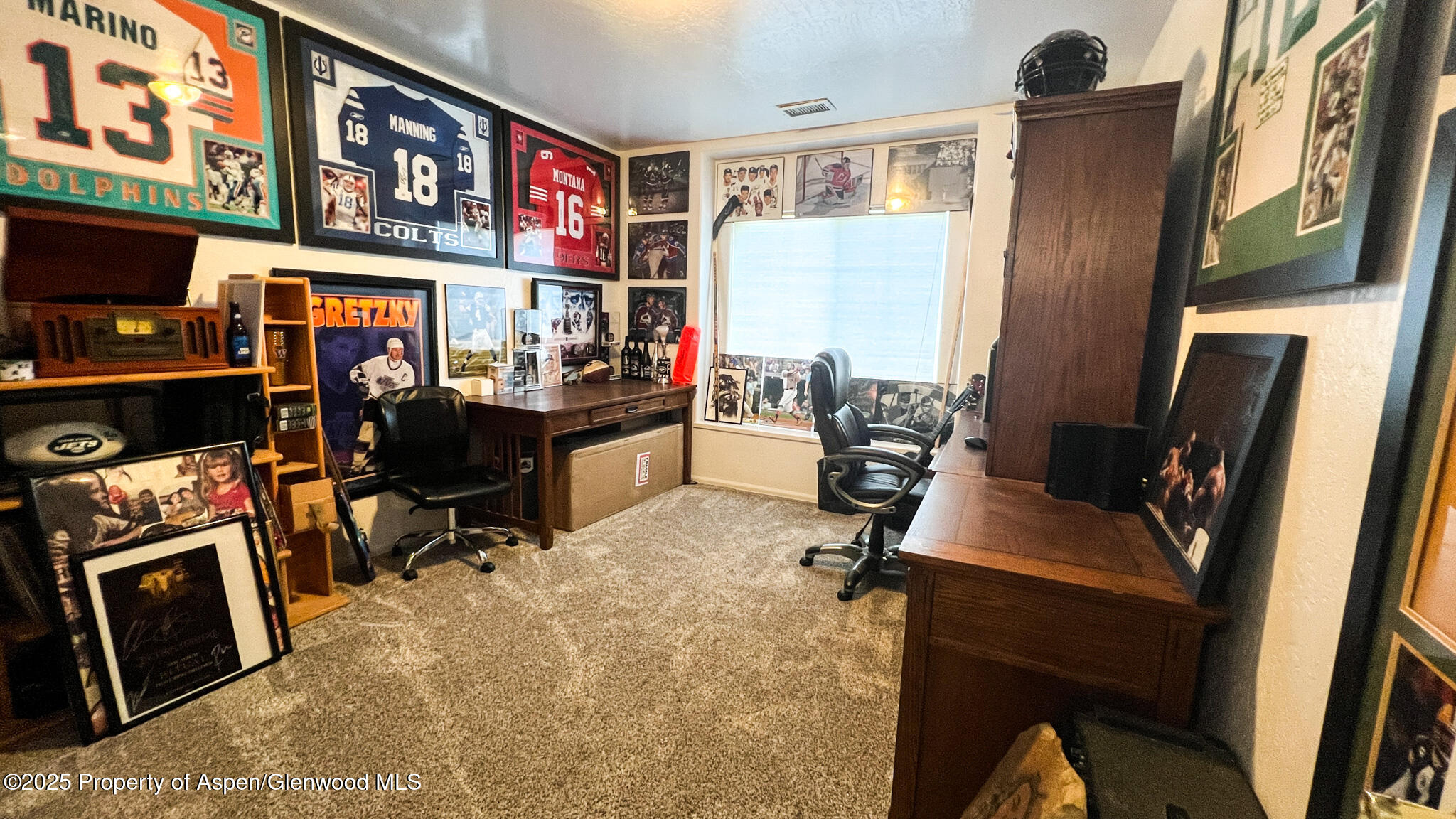 786 Comstock Drive Fruita, CO 81521 - Photo 23 of 38 a view of a workspace with furniture and a window