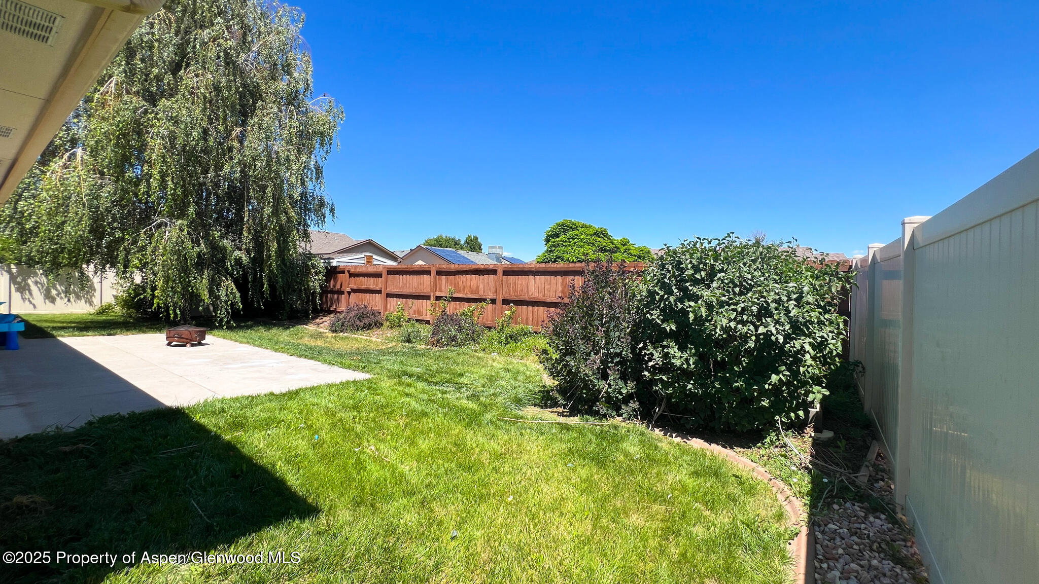 786 Comstock Drive Fruita, CO 81521 - Photo 35 of 38 a view of a yard with plants