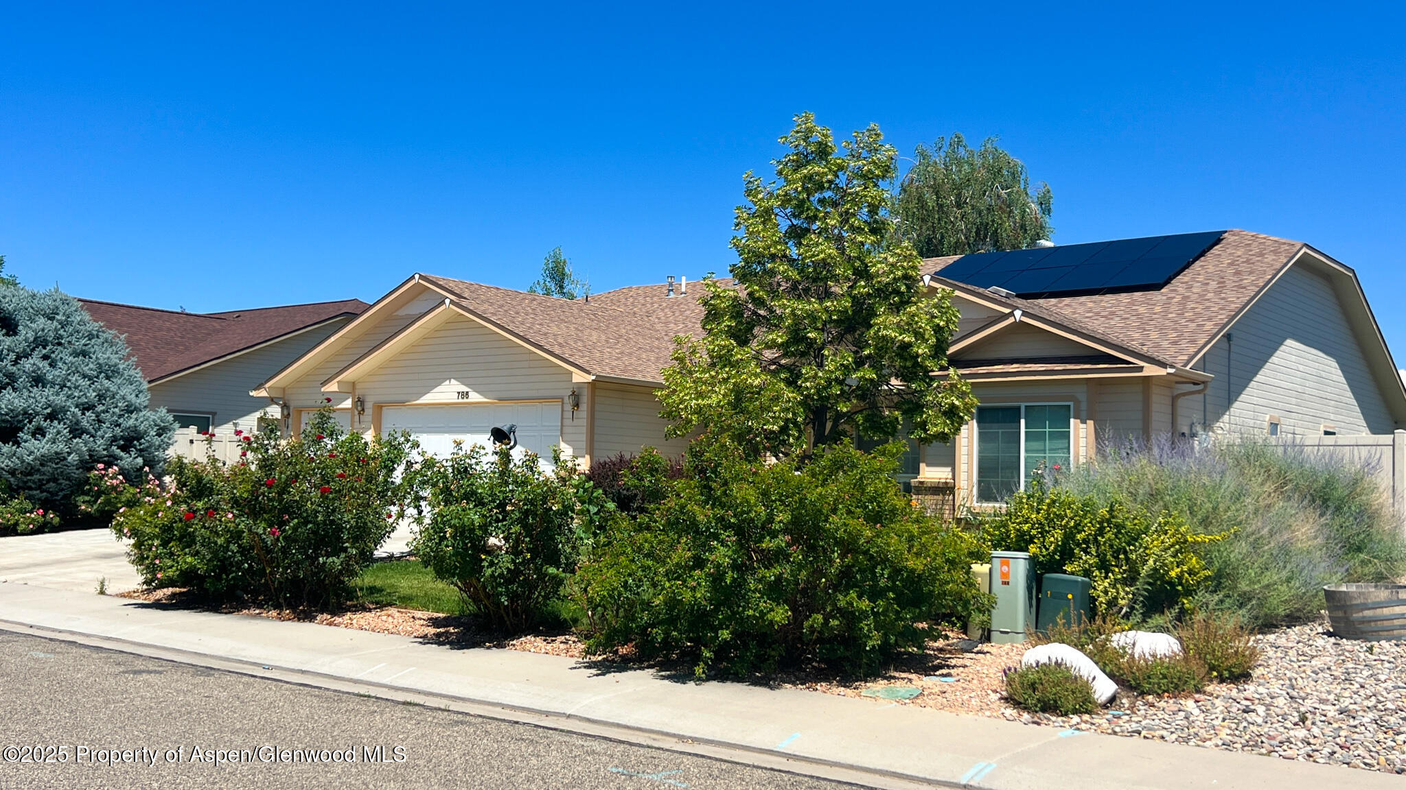 786 Comstock Drive Fruita, CO 81521 - Photo 37 of 38 a front view of a house with a yard