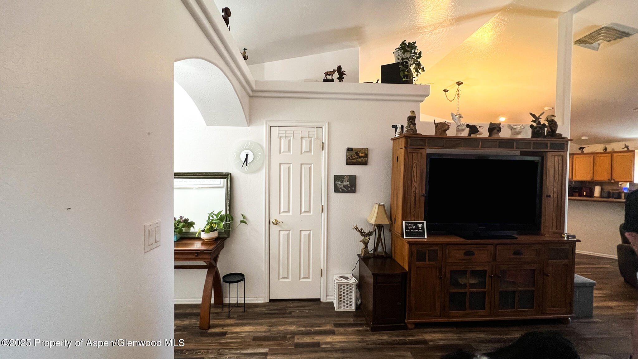 786 Comstock Drive Fruita, CO 81521 - Photo 4 of 38 a living room with furniture and a flat screen tv