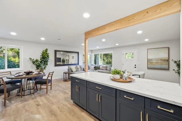 a view of a kitchen and dining room