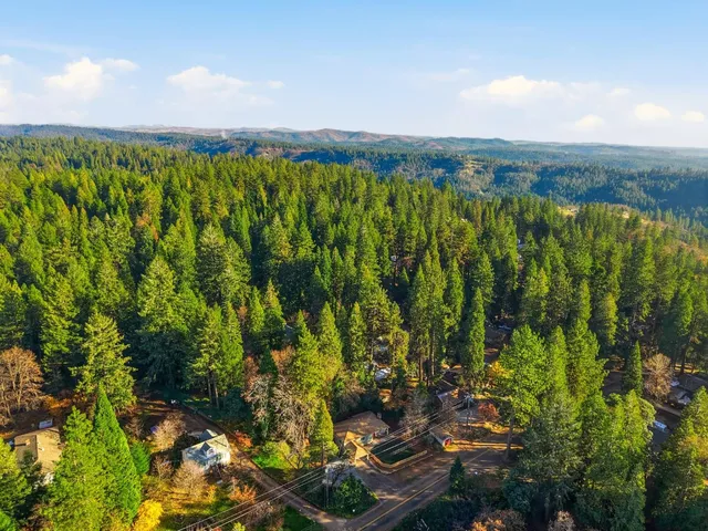a view of lake with green space