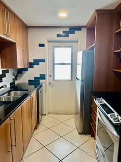 a dining room with furniture window wooden floor