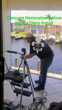 a view of a ocean with boats and trees in the background