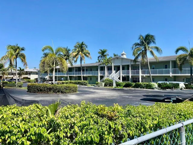 a view of a lake with a building in the background