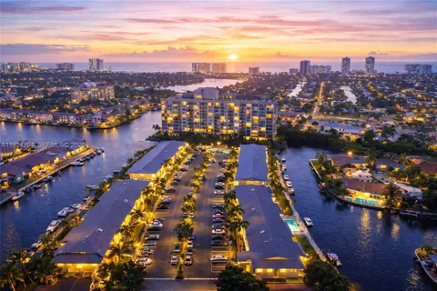 a view of a lake with a building in the background