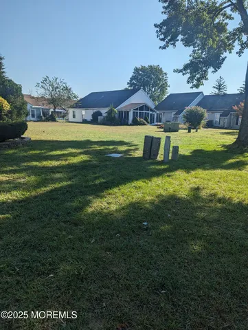 a view of a house with a big yard