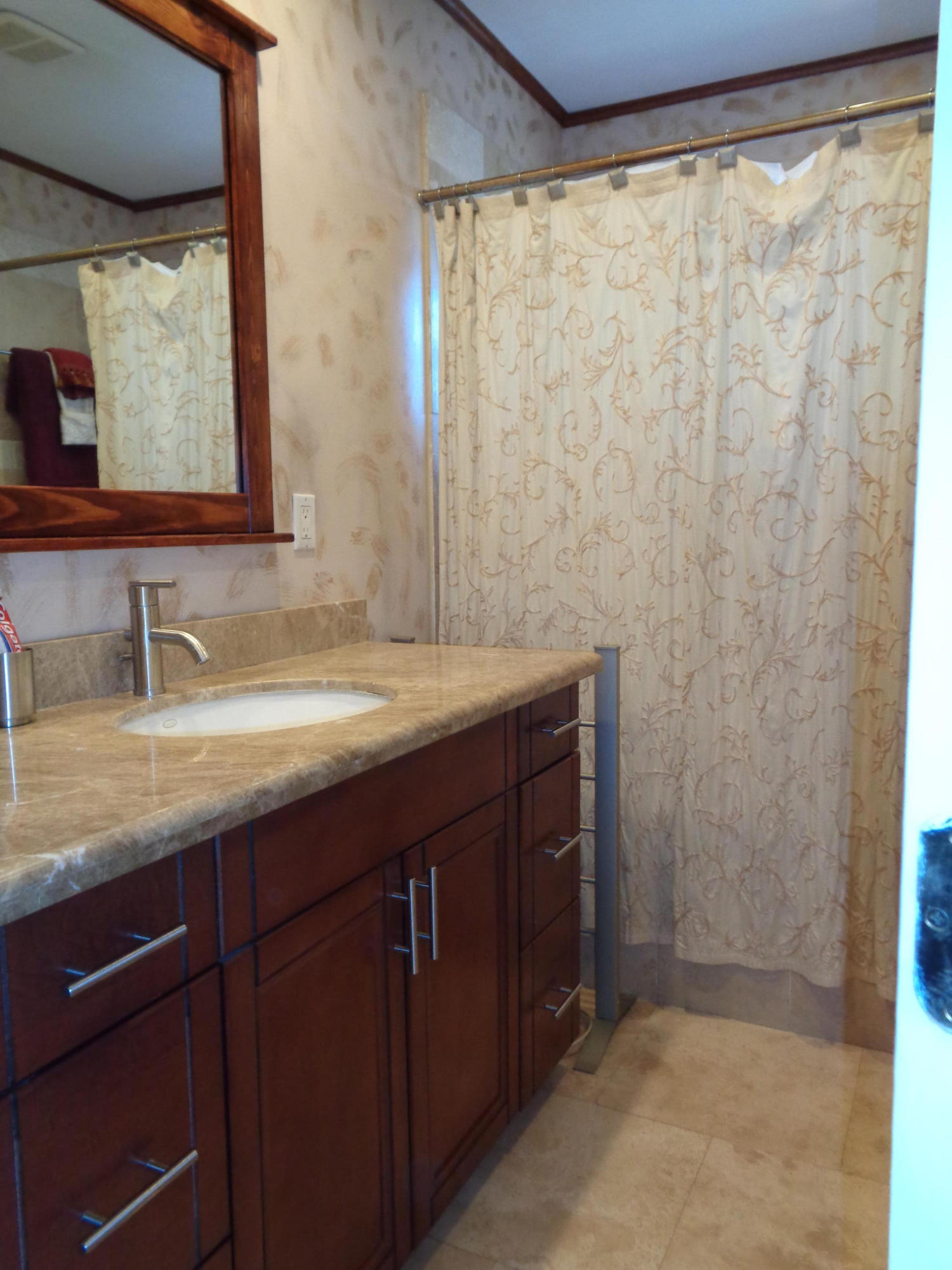775 Northwest 4th Avenue Boca Raton, FL 33432 - Photo 14 of 14 a bathroom with a granite countertop sink and a mirror