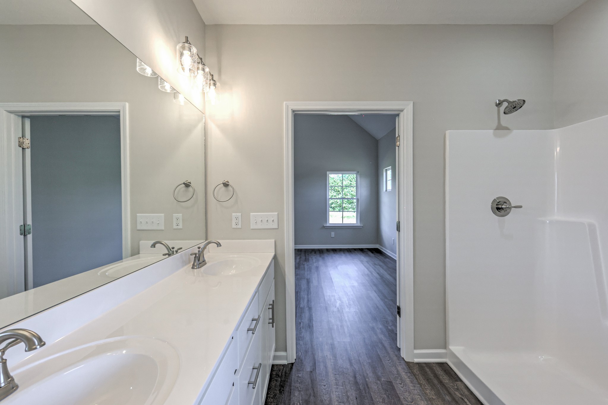 41 Bartow Street Decherd, TN 37324 - Photo 29 of 38 a spacious bathroom with a double vanity sink and a mirror