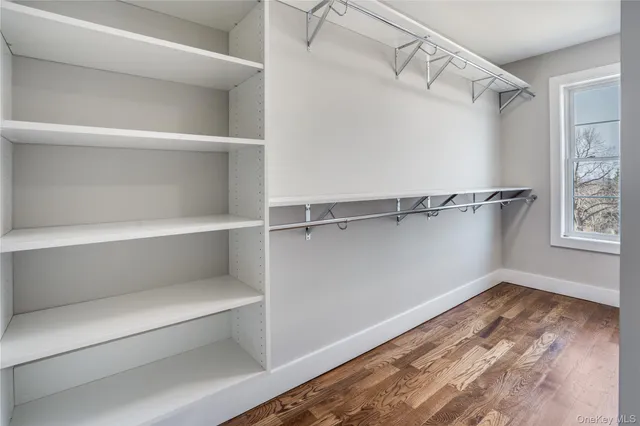 a view of a room with racks on the wall