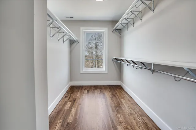 a view of small space with racks on the wall