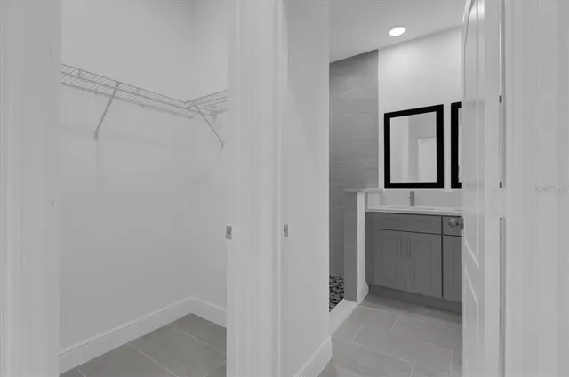 a view of hallway with washer and dryer