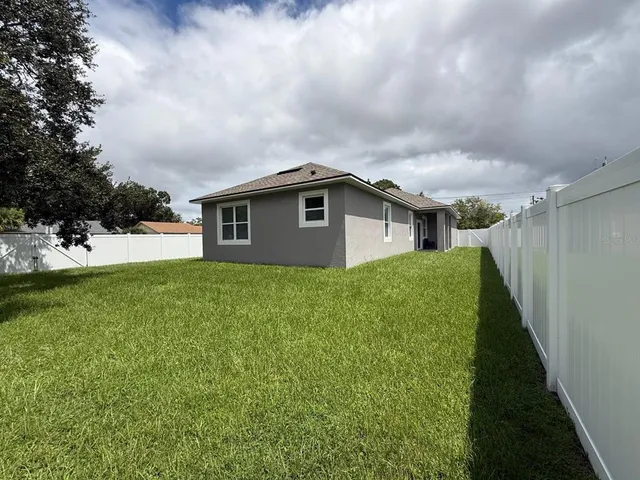 a house view with garden space