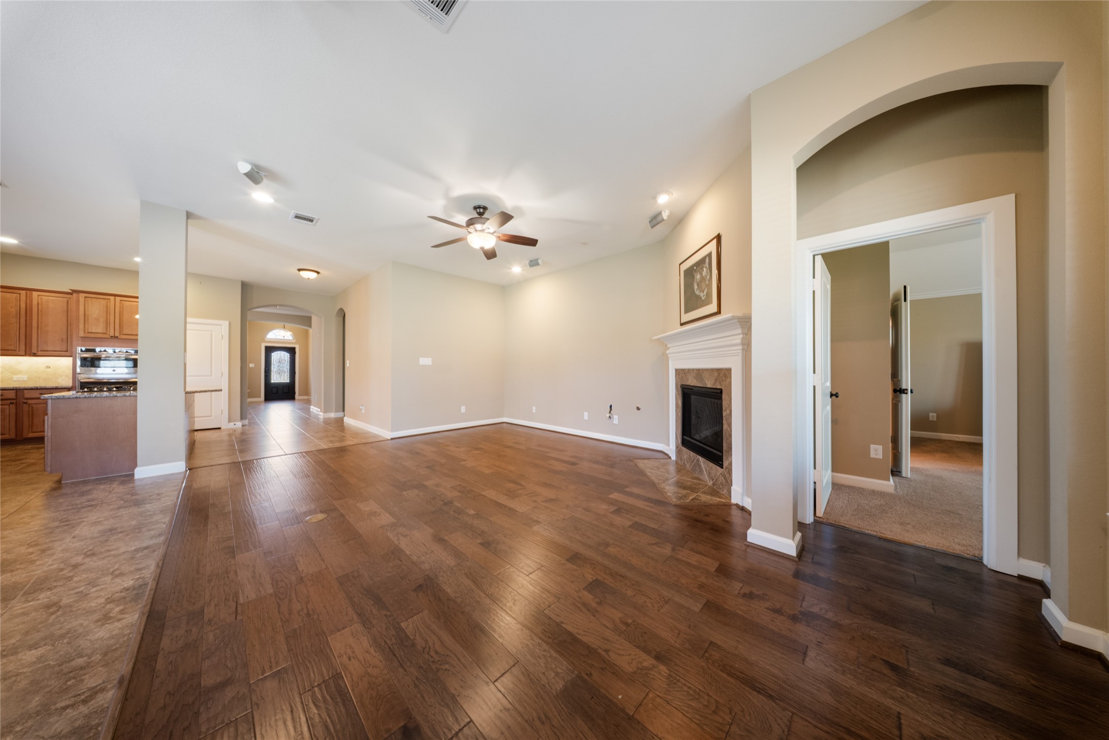 176 Castlegate Lane Houston, TX 77065 - Photo 6 of 33 a view of a living room and wooden floor