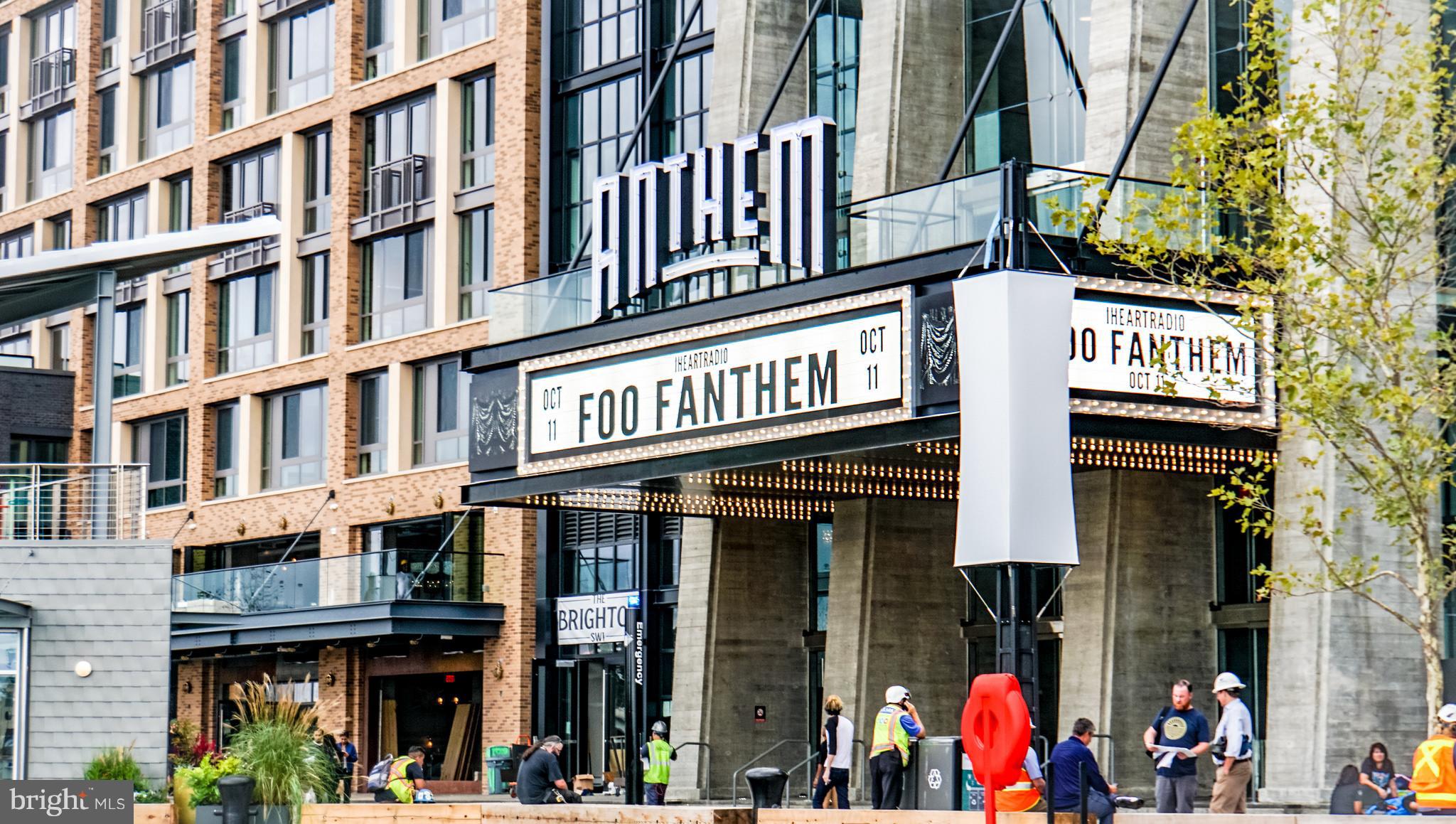 1301 Delaware Avenue Southwest, Unit N512 Washington, DC 20024 - Photo 26 of 28 a view of a building with retail shops