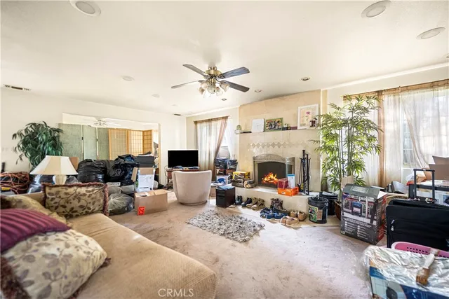 a bedroom with furniture and a window