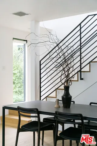 a vase of flowers sitting on a table