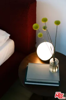 a potted plant sitting on top of a shelf