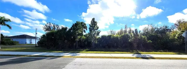 a view of swimming pool with a yard