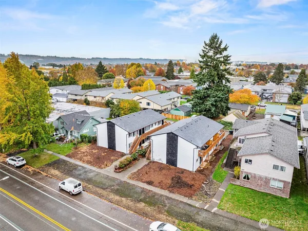 an aerial view of a house with a garden