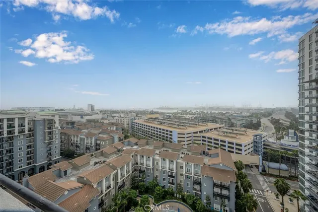 a view of a city with tall buildings