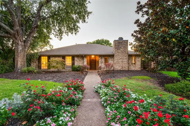 a view of a house with large garden