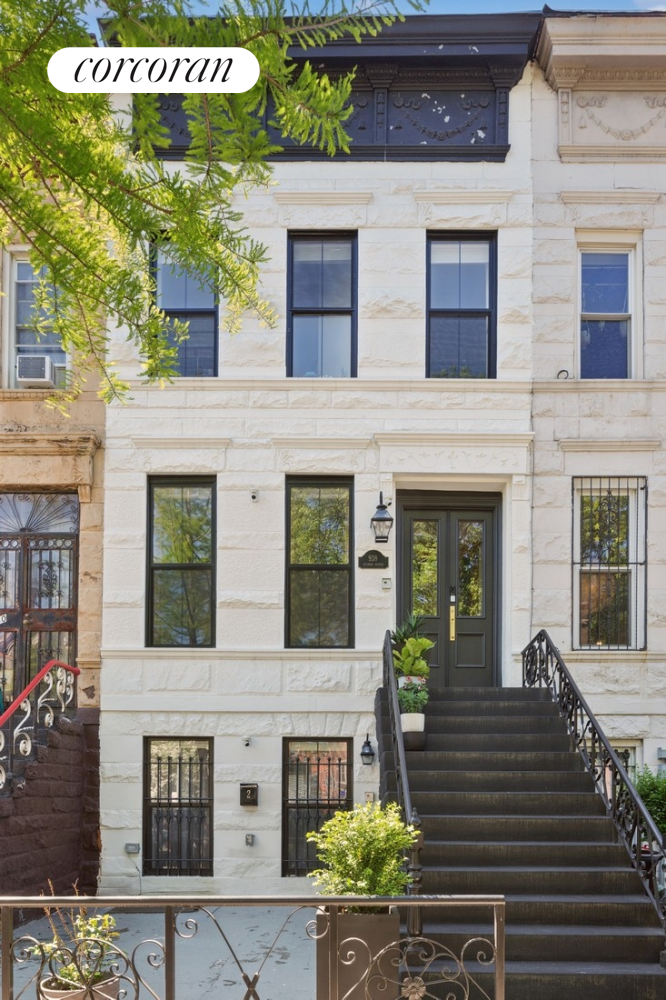 a front view of a building with glass windows