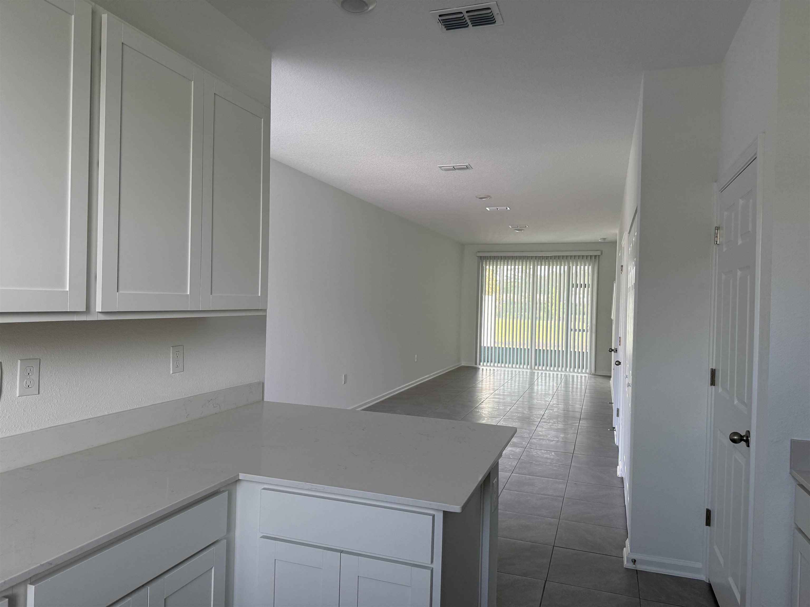 82 Crisanto Road St. Augustine, FL 32084 - Photo 5 of 12 a view of livingroom and hardwood