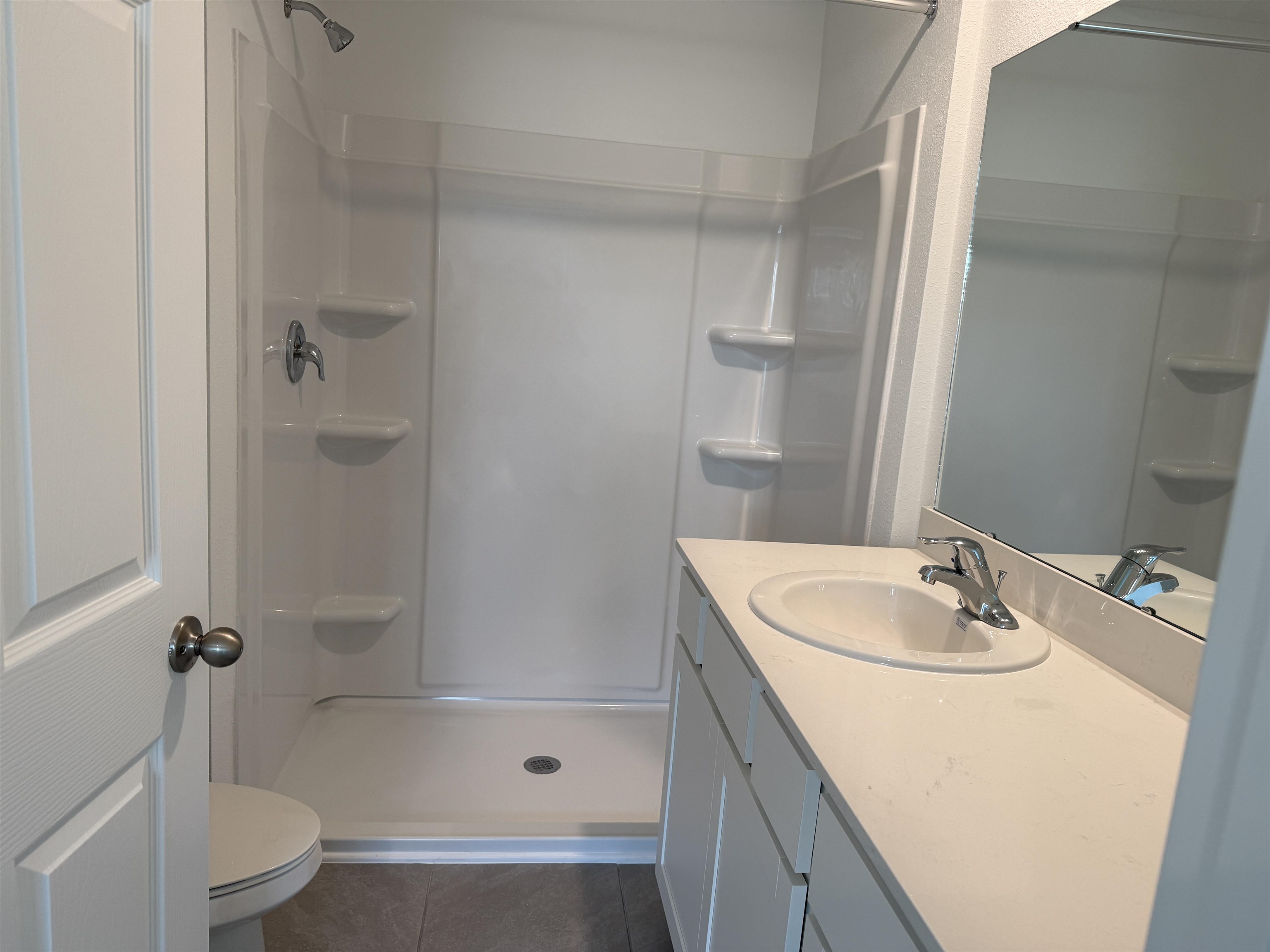 82 Crisanto Road St. Augustine, FL 32084 - Photo 8 of 12 a bathroom with a sink a toilet and shower