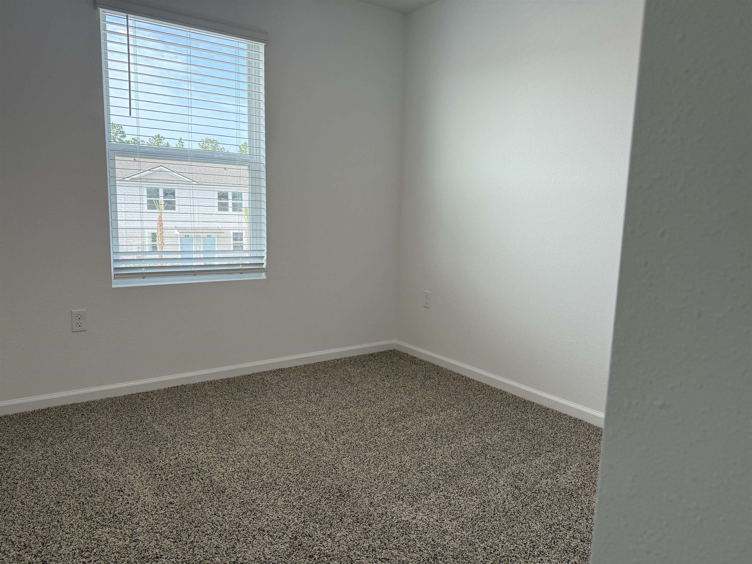 82 Crisanto Road St. Augustine, FL 32084 - Photo 10 of 12 an empty room with a window