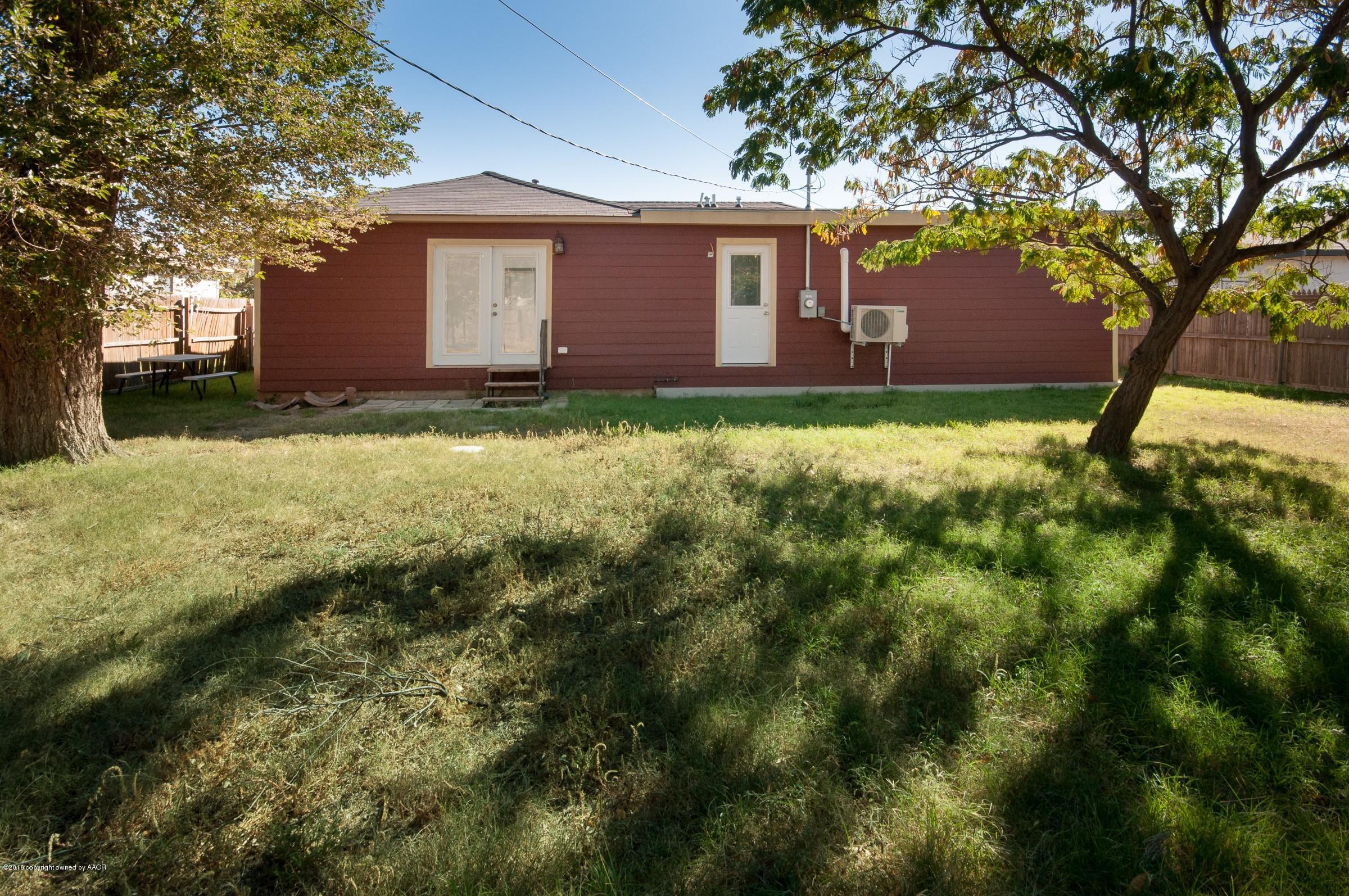 4402 Parker Street Amarillo, TX 79110 - Photo 20 of 21 a view of a house with a yard