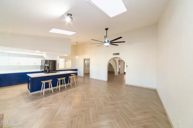 a dining room with a table and chairs