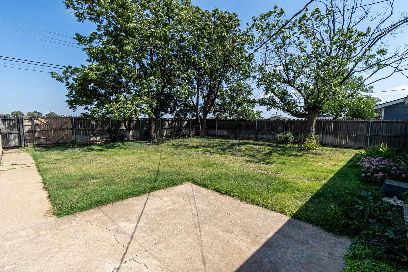 4413 Southeast 28th Avenue Amarillo, TX 79103 - Photo 12 of 13 a view of a backyard with a garden