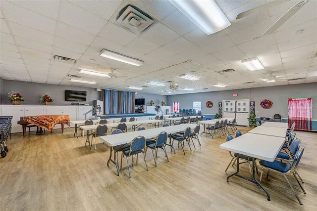 a workspace with furniture and wooden floor