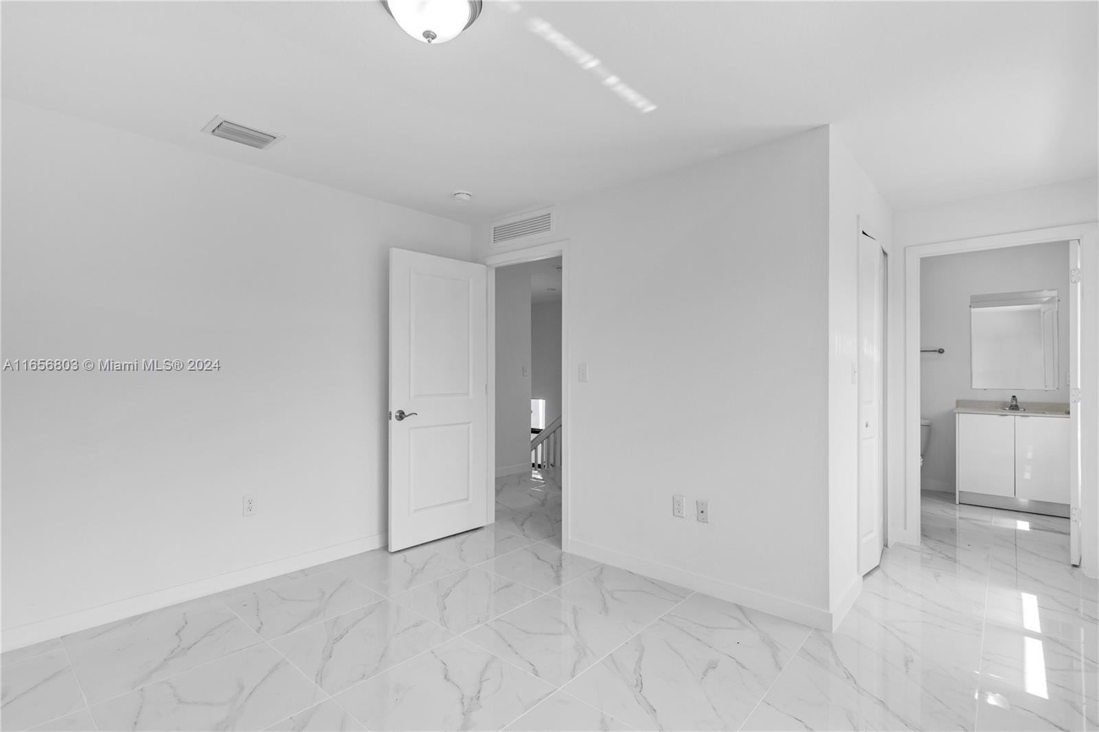 1801 Northwest 112th Street, Unit 1 Miami, FL 33167 - Photo 15 of 22 a view of an empty room