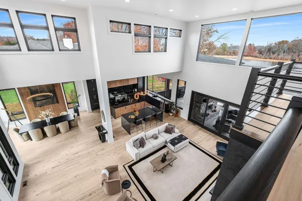 a view of a workspace with furniture and a computer