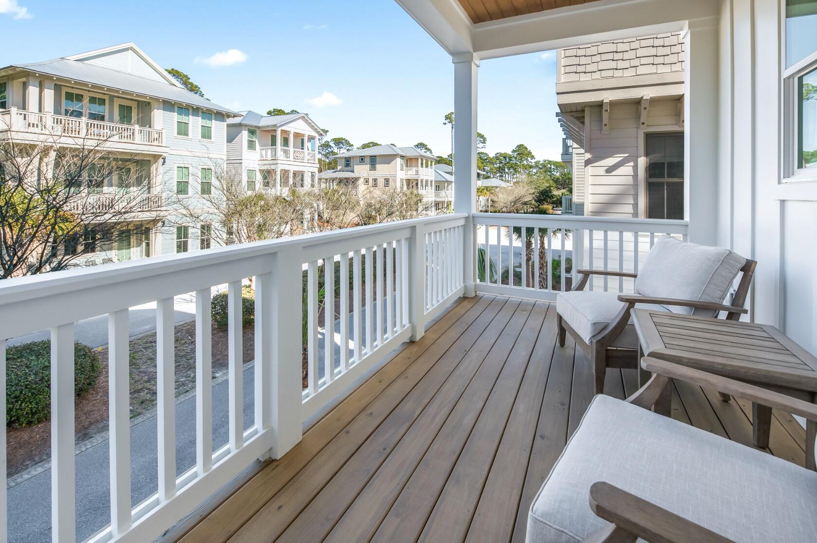 205 Redbud Ln Inlet Beach Inlet Beach, FL 32461 - Photo 16 of 34 a view of a balcony with wooden floor