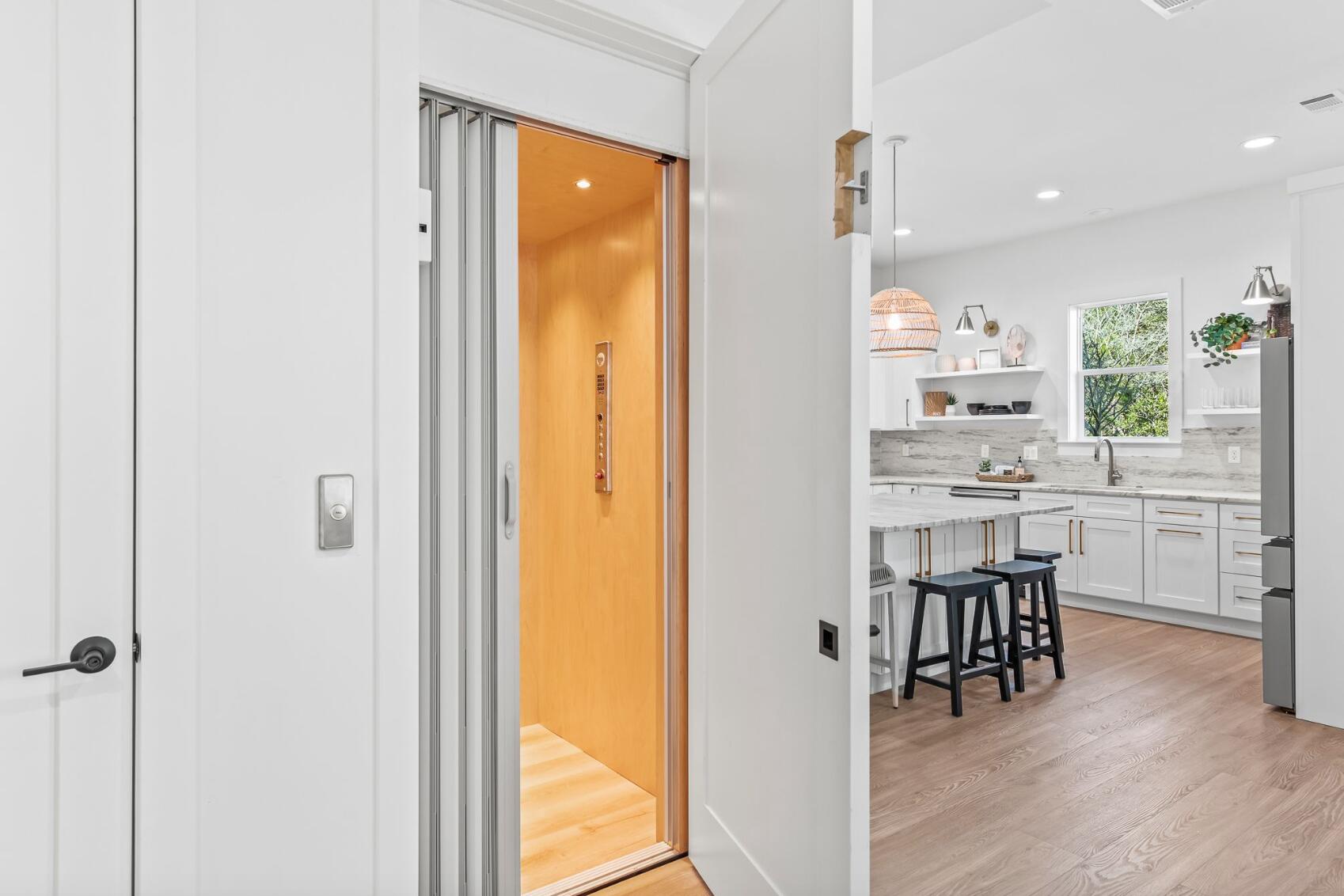 205 Redbud Ln Inlet Beach Inlet Beach, FL 32461 - Photo 20 of 34 a view of kitchen dining table chairs and window